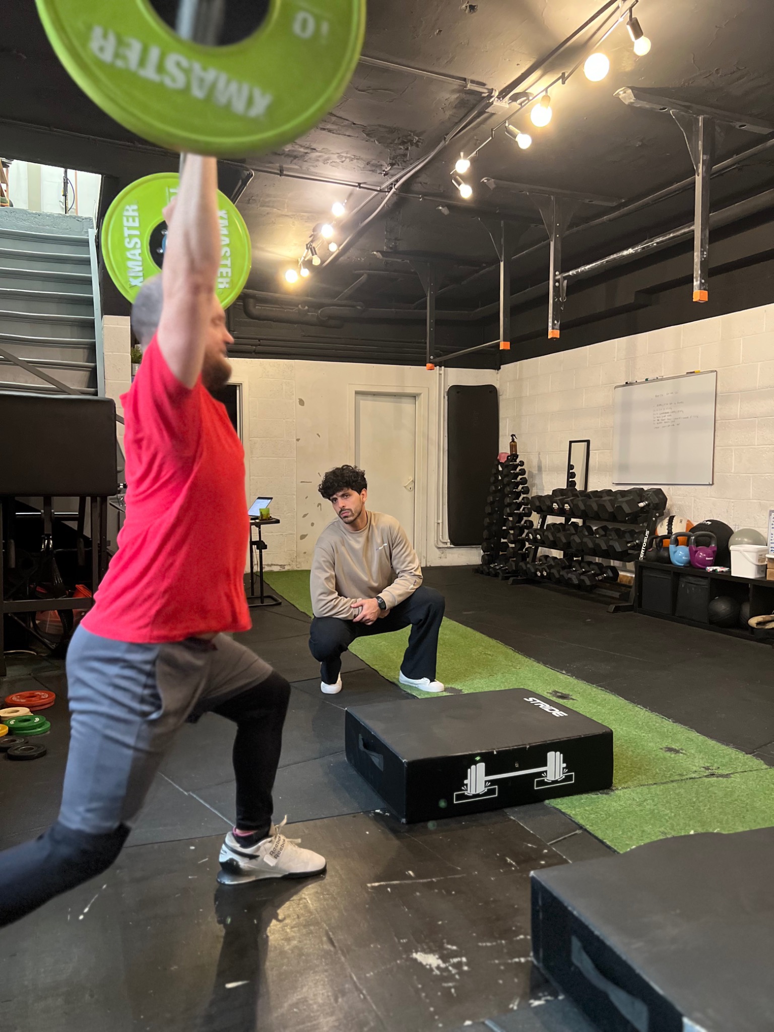 A client training with a coach at Numidia